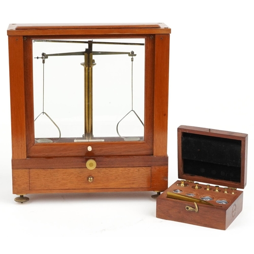 497 - Becker Bros of New York, mahogany cased balance scales with mahogany travel case and set of brass an... 