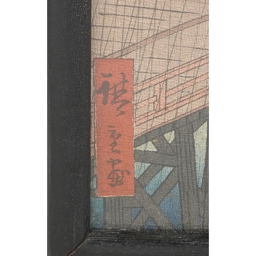 1214 - Figures crossing a bridge, Japanese woodblock print with various character marks, framed and glazed,... 