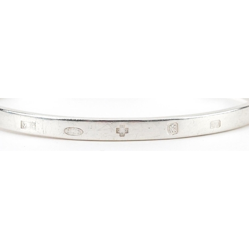 2753 - Maddocks Jewellery Collection, Scottish silver bangle, Edinburgh 2000, 6.5cm in diameter, 20.7g