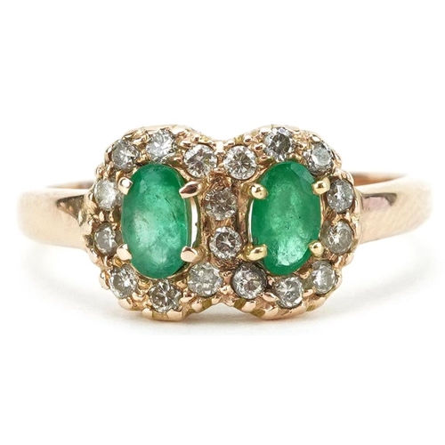 2239 - Unmarked gold emerald and diamond Toi et Moi ring, each emerald approximately 5.10mm x 3.10mm x 2.80... 