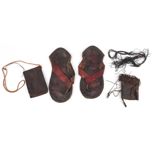 298 - African tribal interest leather comprising pair of sandals and two pockets, each Tuareg tribe, the l... 