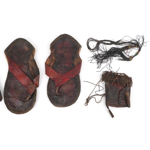 298 - African tribal interest leather comprising pair of sandals and two pockets, each Tuareg tribe, the l... 