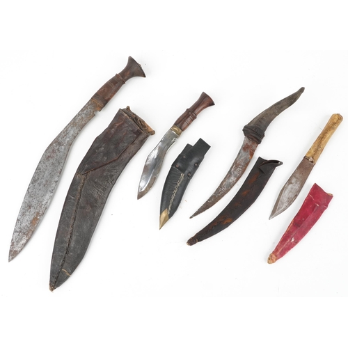 1909 - Four edged weapons including two Gurkha's kukri knives, African tribal interest example with animal ... 