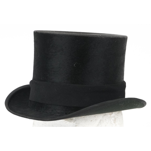 1299 - Dunn & Co of London moleskin top hat with box, size 7