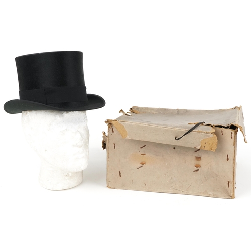 1299 - Dunn & Co of London moleskin top hat with box, size 7