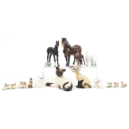 678 - Collectable china including Beswick horses, Beswick Siamese cat and a Wade Disney blow up Siamese ca... 