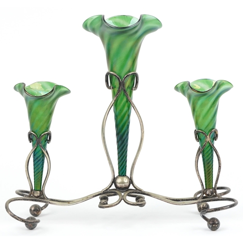 526 - Art Nouveau silver plated three branch epergne stand with three iridescent green glass liners, 34cm ... 