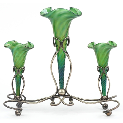 526 - Art Nouveau silver plated three branch epergne stand with three iridescent green glass liners, 34cm ... 