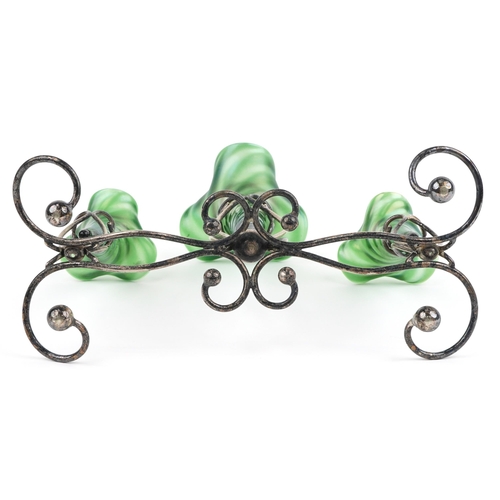 526 - Art Nouveau silver plated three branch epergne stand with three iridescent green glass liners, 34cm ... 