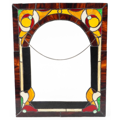 1384 - Four leaded stained glass window panels including a pair, each decorated with flowers, the largest 6... 