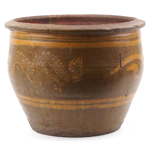 1107 - Large Chinese archaic style terracotta planter having and ash and brown glaze, incised with two drag... 