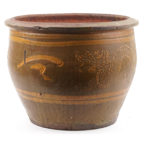 1107 - Large Chinese archaic style terracotta planter having and ash and brown glaze, incised with two drag... 