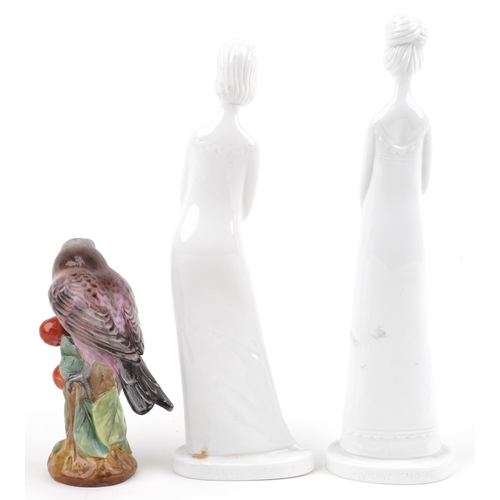 1286 - Two Spode figurines and a Spode hand painted porcelain finch, the largest 27.5cm high