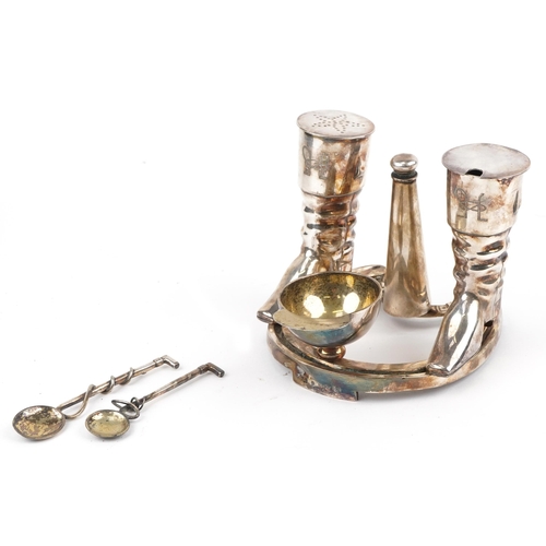 147 - Elkington & Co, equestrian interest silver plated cruet set in the form of a horseshoe, riding boots... 