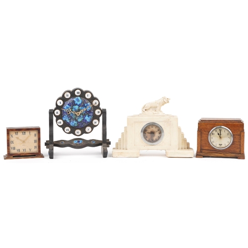 525 - Three Art Deco mantle clocks including a faux tortoiseshell eight day example and a hardwood swingin... 