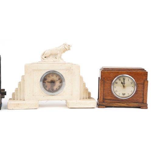 525 - Three Art Deco mantle clocks including a faux tortoiseshell eight day example and a hardwood swingin... 