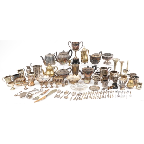 1379 - Silver plated metalware including pair of campana urns, trophy, coffee pot and teapot