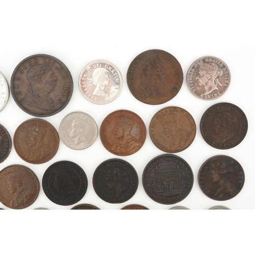 2108 - Early 19th century and later Canadian coinage and tokens including Nova Scotia one penny tokens, Ban... 