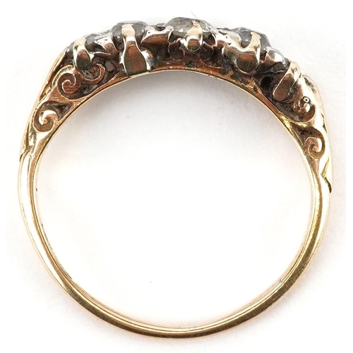 2250 - Antique gold graduated diamond five stone ring, the largest diamond approximately 0.20 carat, size J... 