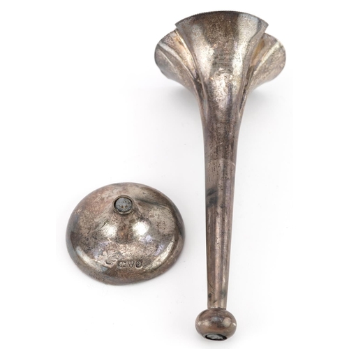 267 - Silver objects comprising seven teaspoons, napkin ring, sugar tongs and bud vase, the largest 19.5cm... 