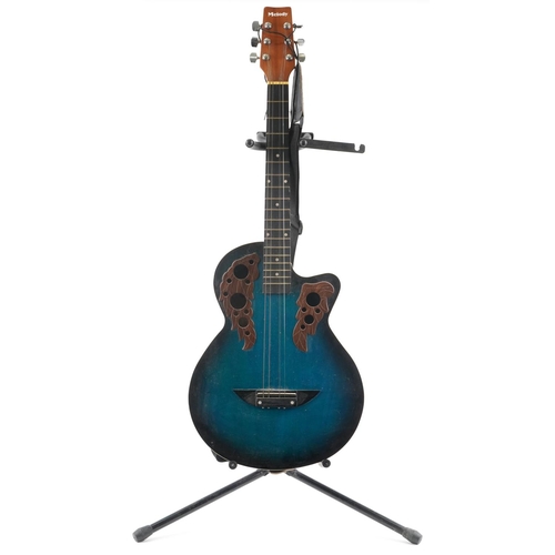 1679 - Melody six string acoustic guitar with Stagg guitar stand, the guitar 96cm in length