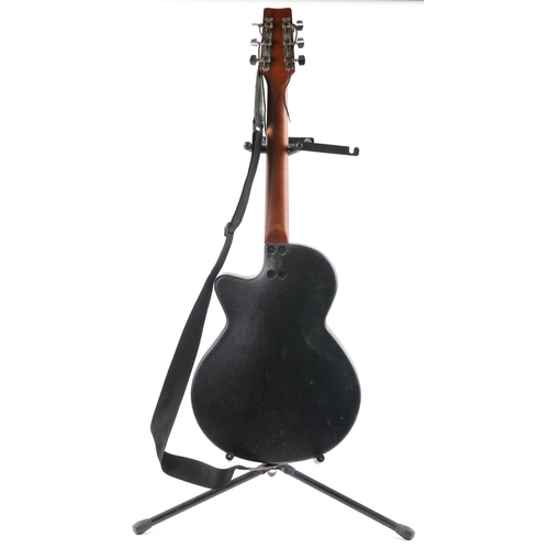 1679 - Melody six string acoustic guitar with Stagg guitar stand, the guitar 96cm in length