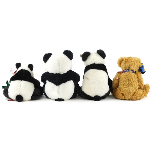 1612 - Hermann teddy bear with growler and jointed limbs and three soft toy pandas, 42cm high