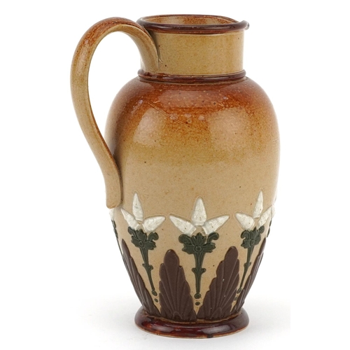 516 - Doulton Lambeth, Art Nouveau Royal Doulton stoneware jug hand painted and incised with stylised flow... 