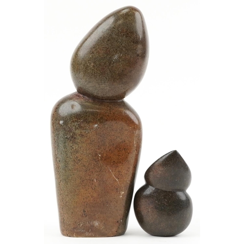 518 - Edward Chiwawa, mid century Zimbabwean figural stone carving and a similar example of a stylised bir... 