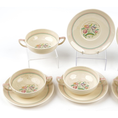 1539 - Set of six Susie Cooper twin handled soup bowls and saucers decorated with stylised flowers, each sa... 