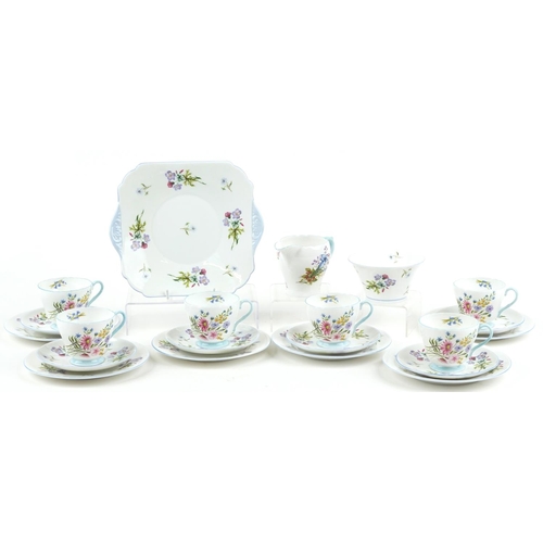 729 - Shelley Wild Flowers six place tea service comprising six trios, milk jug, sugar bowl and sandwich p... 