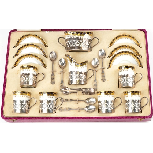 214 - George Jones & Sons, Art Deco Crescent six place coffee service with silver holders, set of six teas... 
