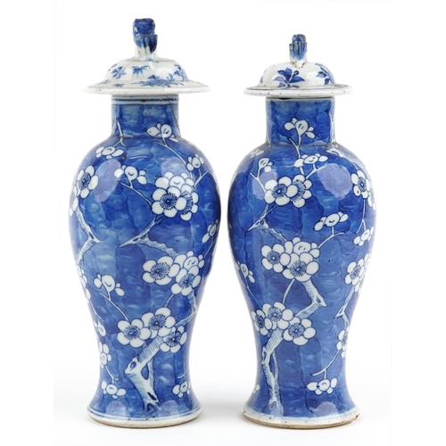 96 - Pair of Chinese blue and white porcelain baluster vases with unassociated covers, each hand painted ... 