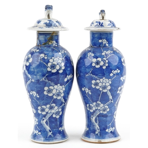 96 - Pair of Chinese blue and white porcelain baluster vases with unassociated covers, each hand painted ... 