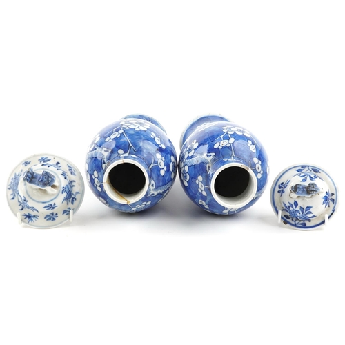 96 - Pair of Chinese blue and white porcelain baluster vases with unassociated covers, each hand painted ... 