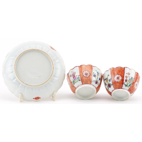 261 - Chinese famille rose porcelain comprising two tea bowls and a saucer, each hand painted with figures... 