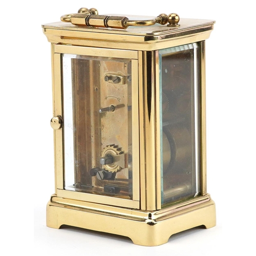 208 - Brass cased Henley carriage clock, 11.5cm high excluding the swing handle