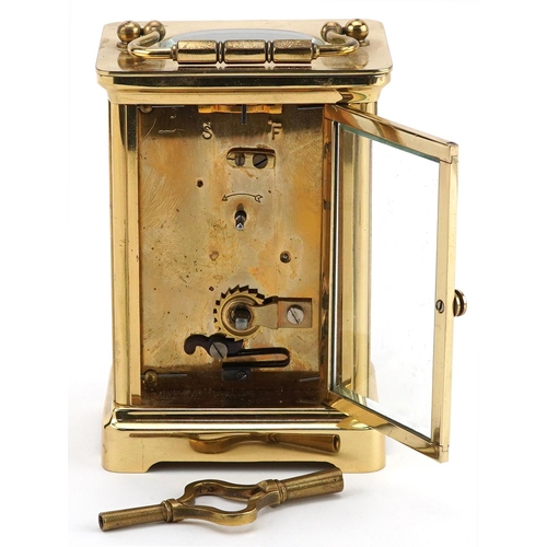 208 - Brass cased Henley carriage clock, 11.5cm high excluding the swing handle