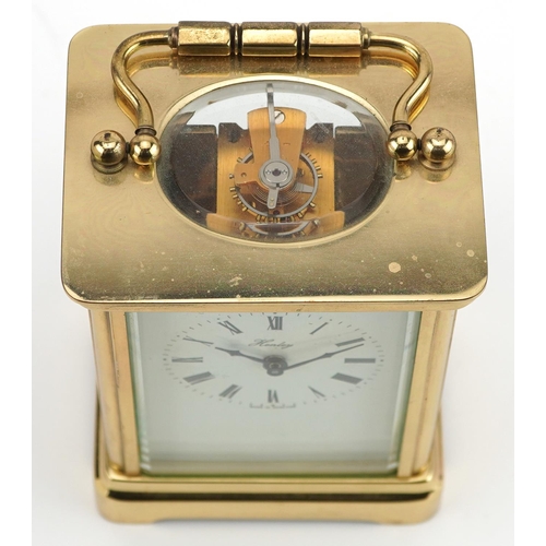 208 - Brass cased Henley carriage clock, 11.5cm high excluding the swing handle