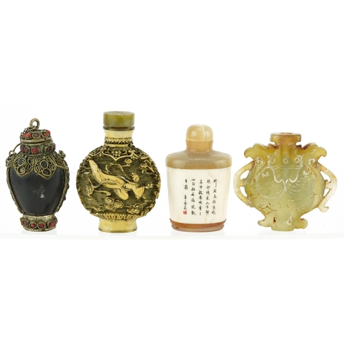 1534 - Nine Chinese snuff bottles including a green and russet jade archaic style example, carved bone exam... 