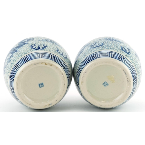 1533 - Pair of Chinese blue and white porcelain jar vases hand painted with dragons chasing the flaming pea... 