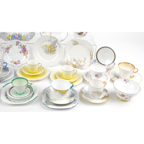 546 - Art Deco and later Shelley teaware including Mode Saucers and Tall Trees pattern saucers, the larges... 