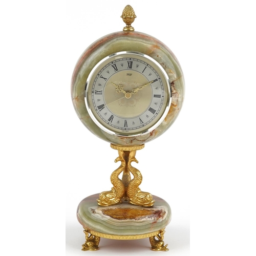 591 - Xavier of London, 19th century style onyx and gilt metal mantle clock with classical dolphin support... 