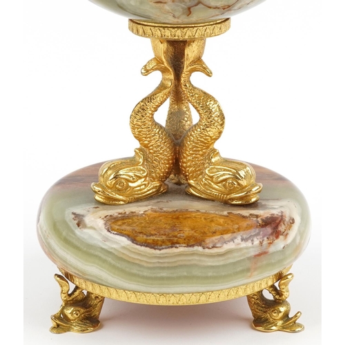 591 - Xavier of London, 19th century style onyx and gilt metal mantle clock with classical dolphin support... 