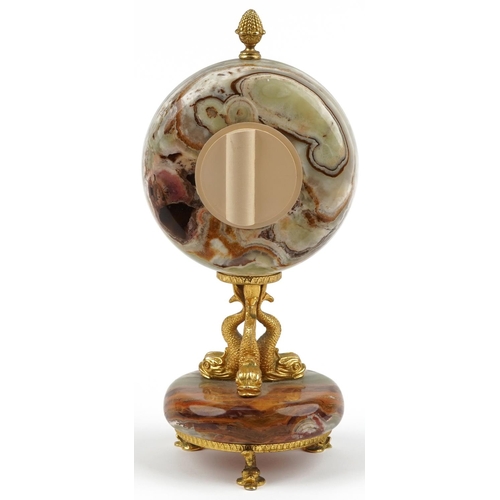 591 - Xavier of London, 19th century style onyx and gilt metal mantle clock with classical dolphin support... 