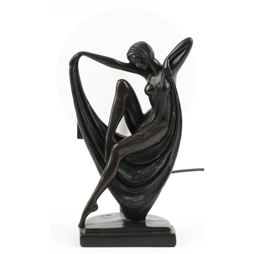 548 - Art Deco style bronzed figural table lamp with frosted glass shade in the form of a semi nude female... 