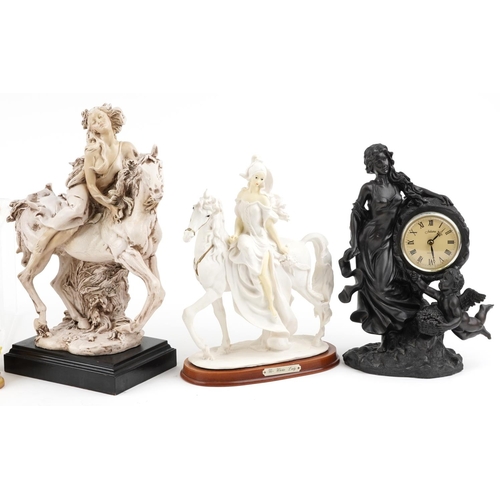 1399 - Decorative figures including a bronzed figural mantle clock, statue of a female on horseback entitle... 