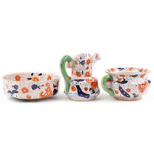 1409 - Masons style ironstone wash jug, basin and chamber pot, each decorated in the Imari palette with flo... 