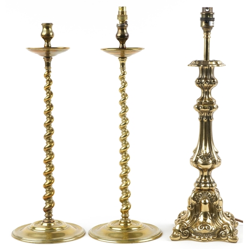 1394A - Pair of 19th century turned brass barley twist candlesticks and a classical brass table lamp, 51cm h... 