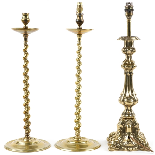 1394A - Pair of 19th century turned brass barley twist candlesticks and a classical brass table lamp, 51cm h... 